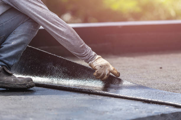 Professional Emergency Waterproofing technician working in Madison, WI